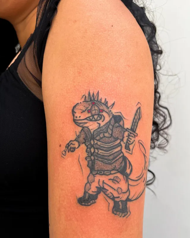 Tatuagem lagarto de faca, braço