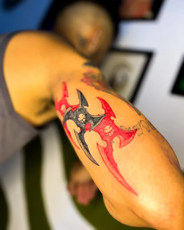 Tatuagem estrela tribal, braço